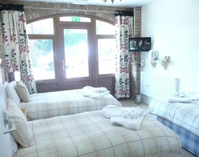 Day use family room with three beds at Rothwell House Hotel.