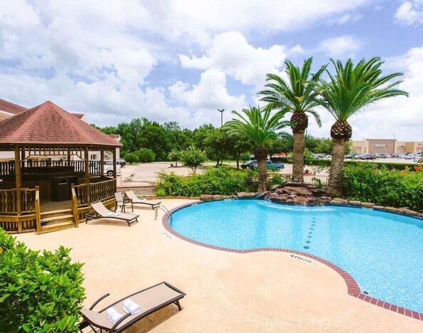 Refreshing outdoor pool at Best Western Pearland Inn.