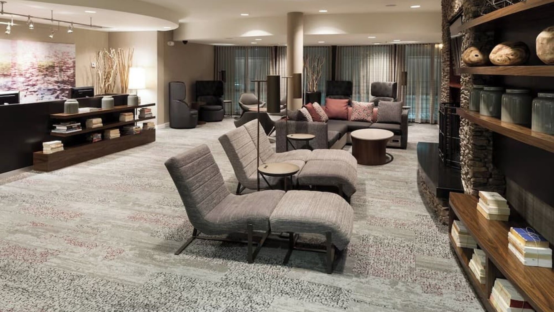 Lobby and coworking lounge at Courtyard By Marriott Hattiesburg.