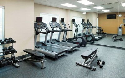Fitness center at Fairfield Inn & Suites By Marriott Houston Pasadena.