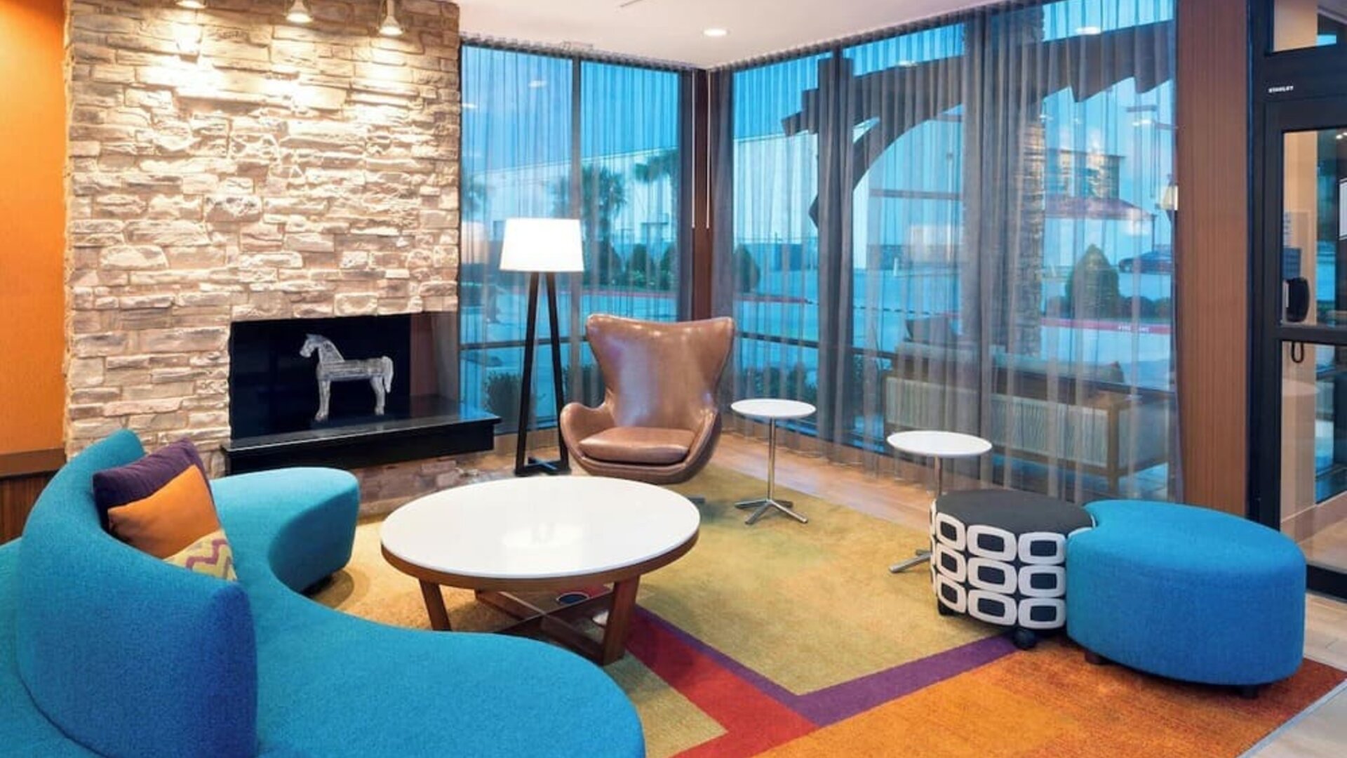 Lobby and coworking lounge at Fairfield Inn & Suites By Marriott Houston Pasadena.