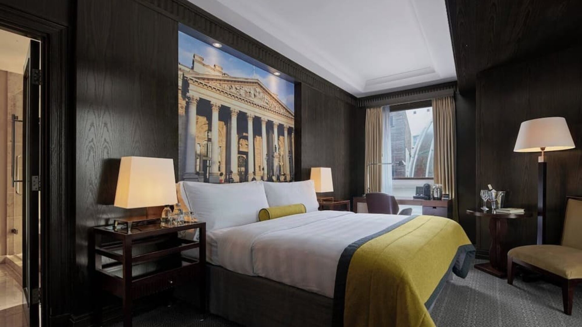 Day use room with work desk and lounge area at Threadneedles, Marriott Autograph Collection Hotel.