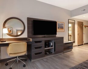 TV and work desk at Hampton Inn Chicago Orland Park.