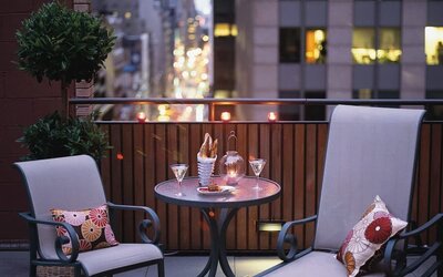 Rooftop lounge chairs at The Muse New York.