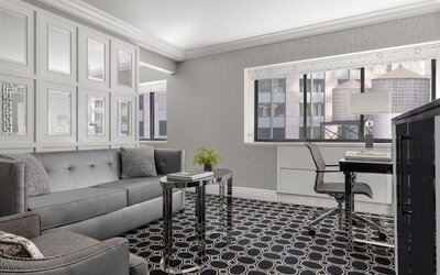King room with lounge at The Muse New York.
