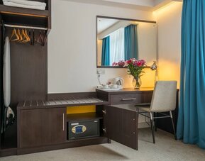 In room workspace at Pelican London Residence & Hotel.