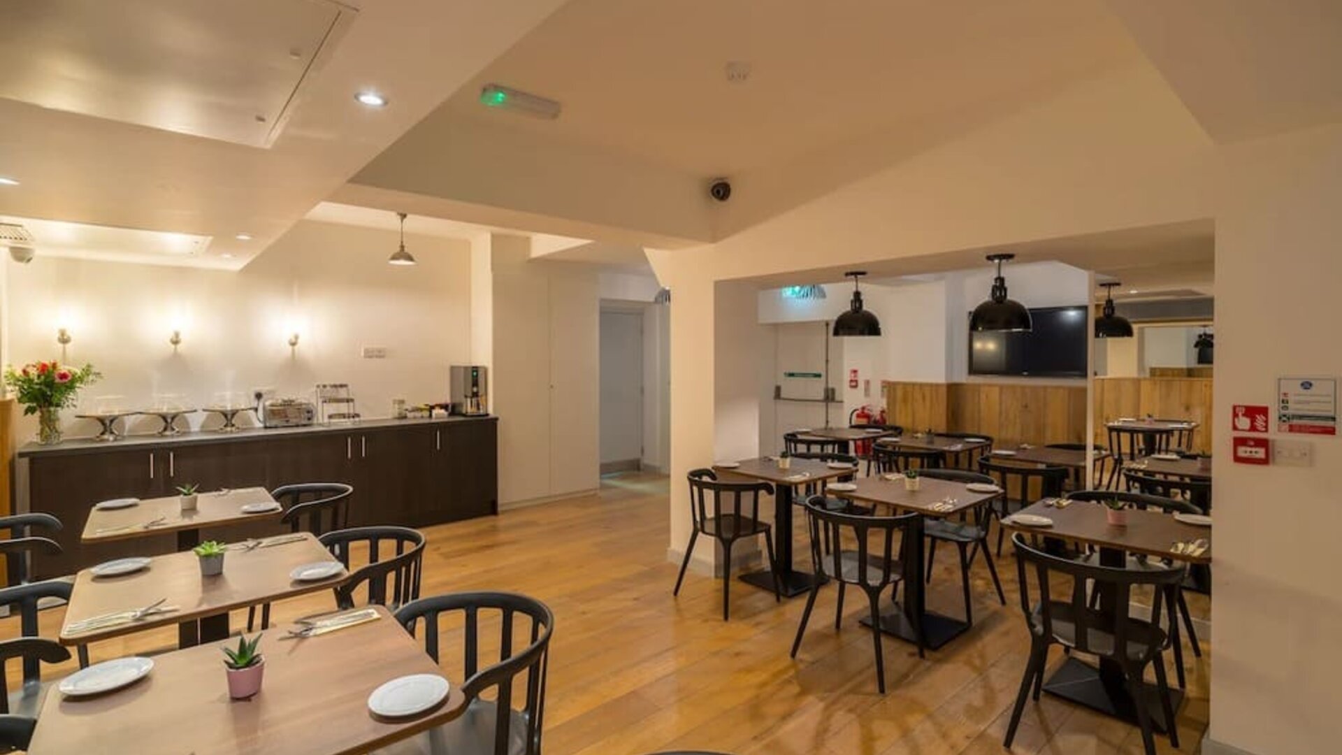 Dining area at Pelican London Residence & Hotel.