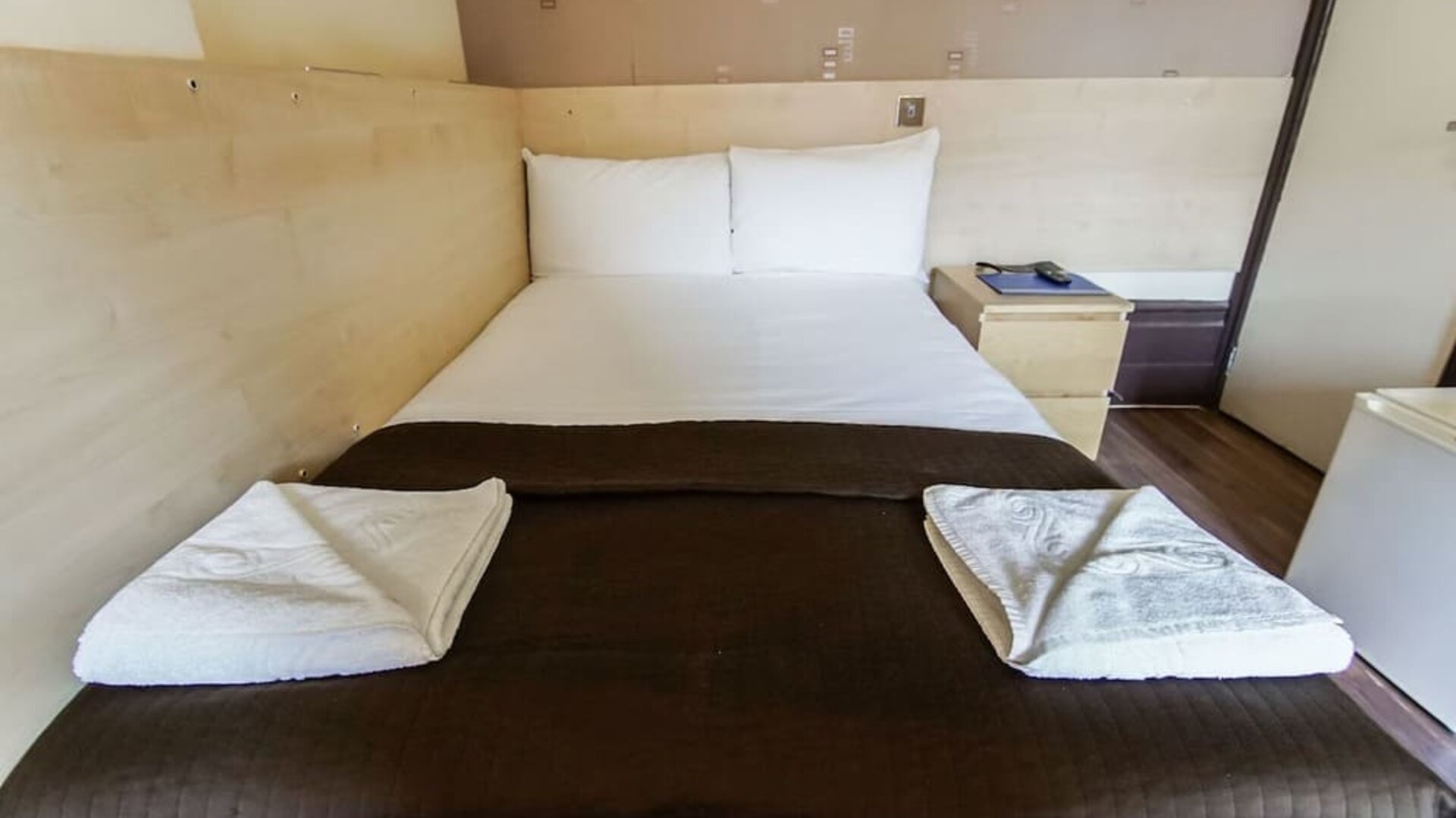 King bed at Tony's House Hotel.