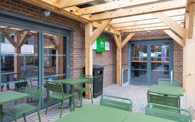 Terrace with seating at Ibis London Gatwick Airport Hotel.
