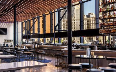 Hotel bar with natural light at Hyatt Regency Chicago.