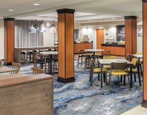 Dining area perfect for coworking at Fairfield Inn & Suites Kansas City Overland Park.