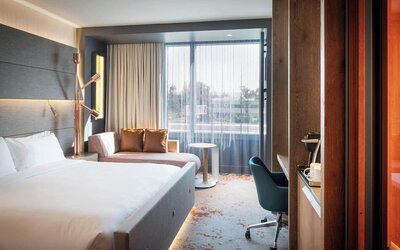 Day use room with work desk and sofa at Hotel Nia, Autograph Collection.