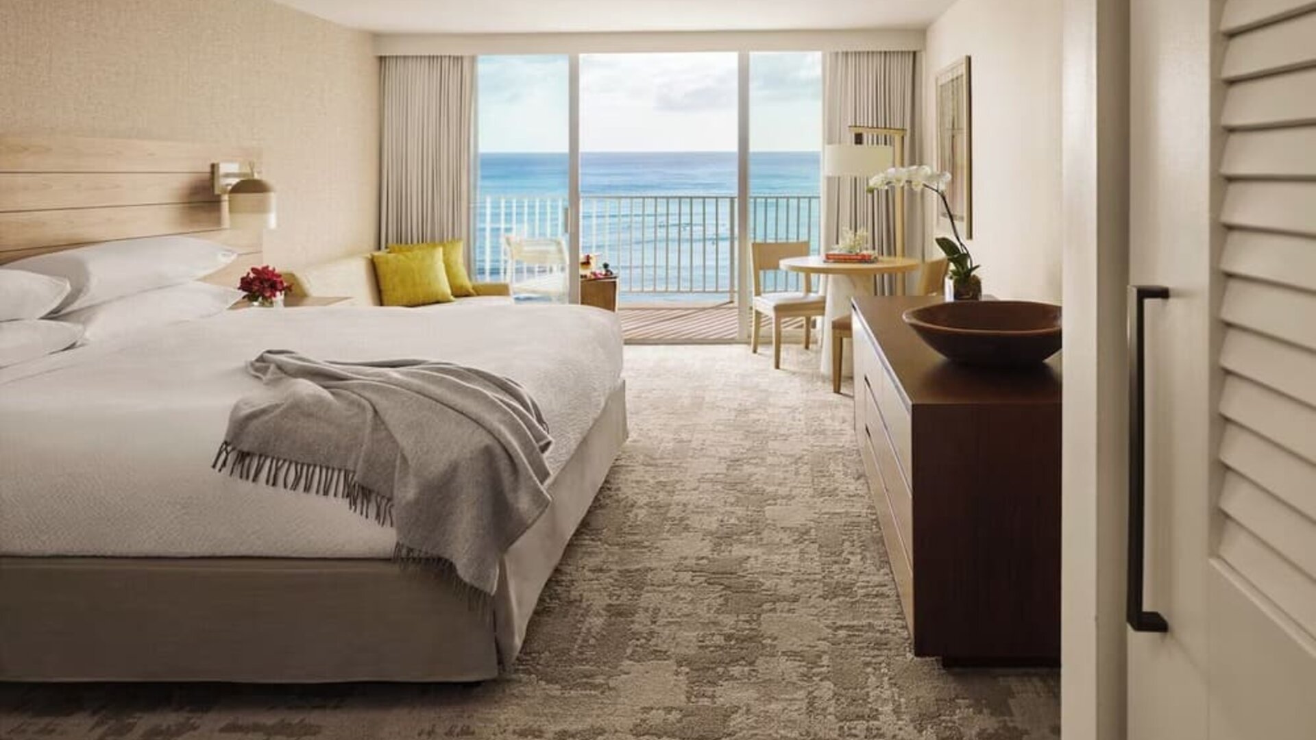 Day use room with balcony and ocean view at Alohilani Resort Waikiki Beach.
