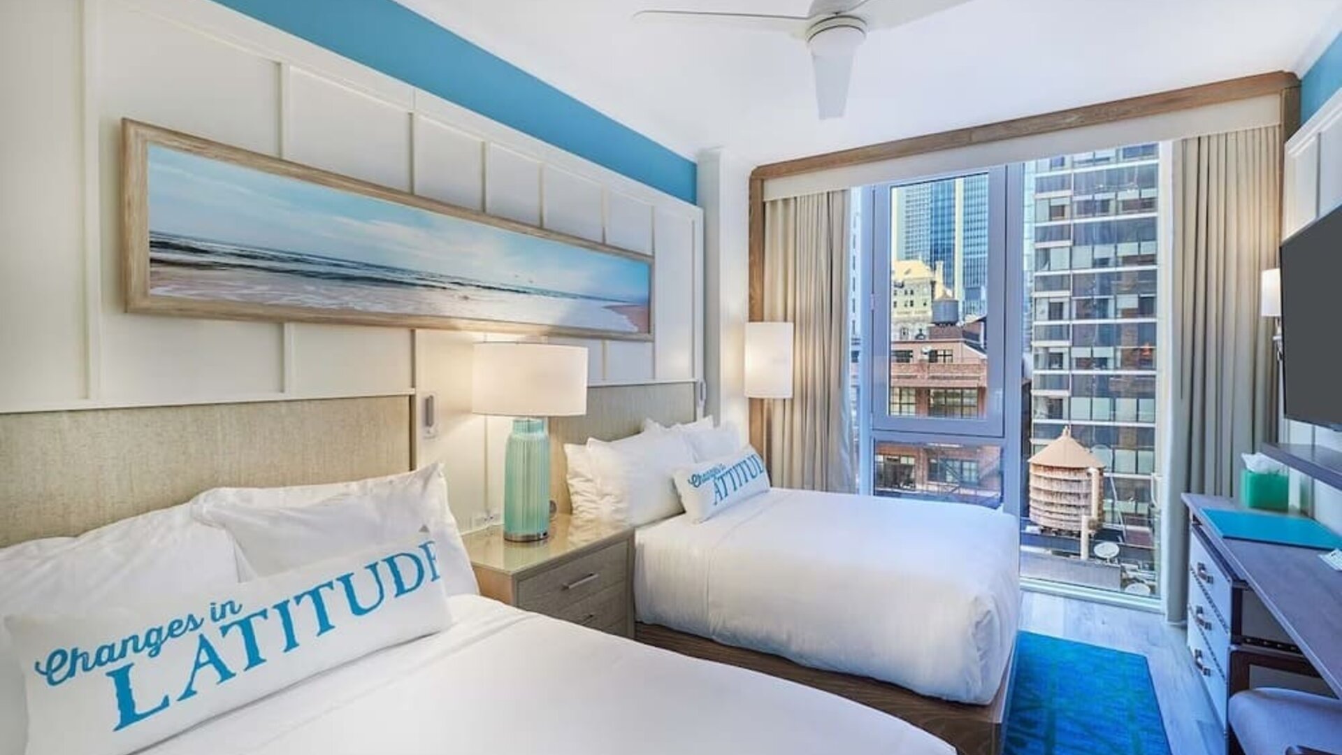 Day room with queen beds at Margaritaville Resort Times Square.