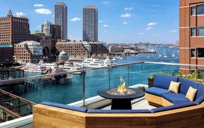 Rooftop furniture with fire pit at The Envoy Hotel, Autograph Collection.