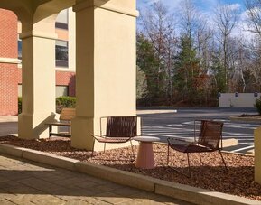 Outdoor seats at Hampton Inn & Suites Providence/Smithfield.