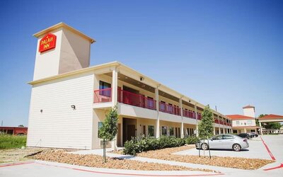 Hotel parking at Palace Inn 290 & Jones Rd.