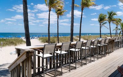 Sun deck with a view of the ocean at Plunge Beach Resort.
