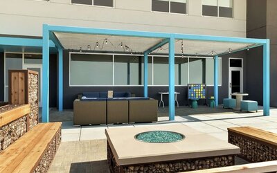 Comfortable patio perfect for coworking at Tru By Hilton Wichita Northeast.
