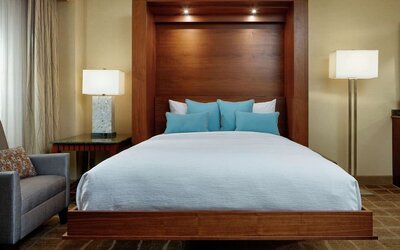 King bed at Embassy Suites By Hilton San Diego-La Jolla.