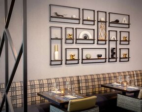 Dining area at Hilton Garden Inn Washington DC Downtown.