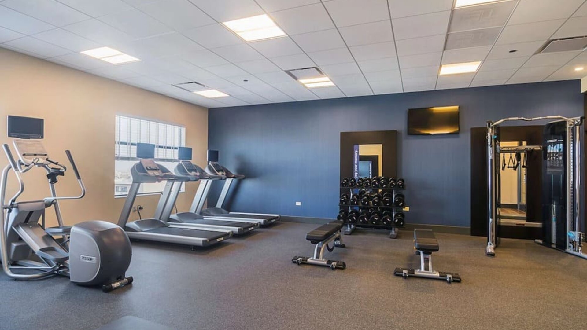 Fitness center at Hampton Inn Chicago North/Loyola Station.
