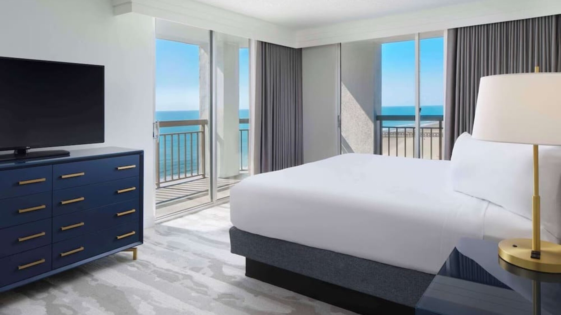 Day use room with balcony overlooking the ocean at Embassy Suites By Hilton Myrtle Beach Oceanfront Resort.