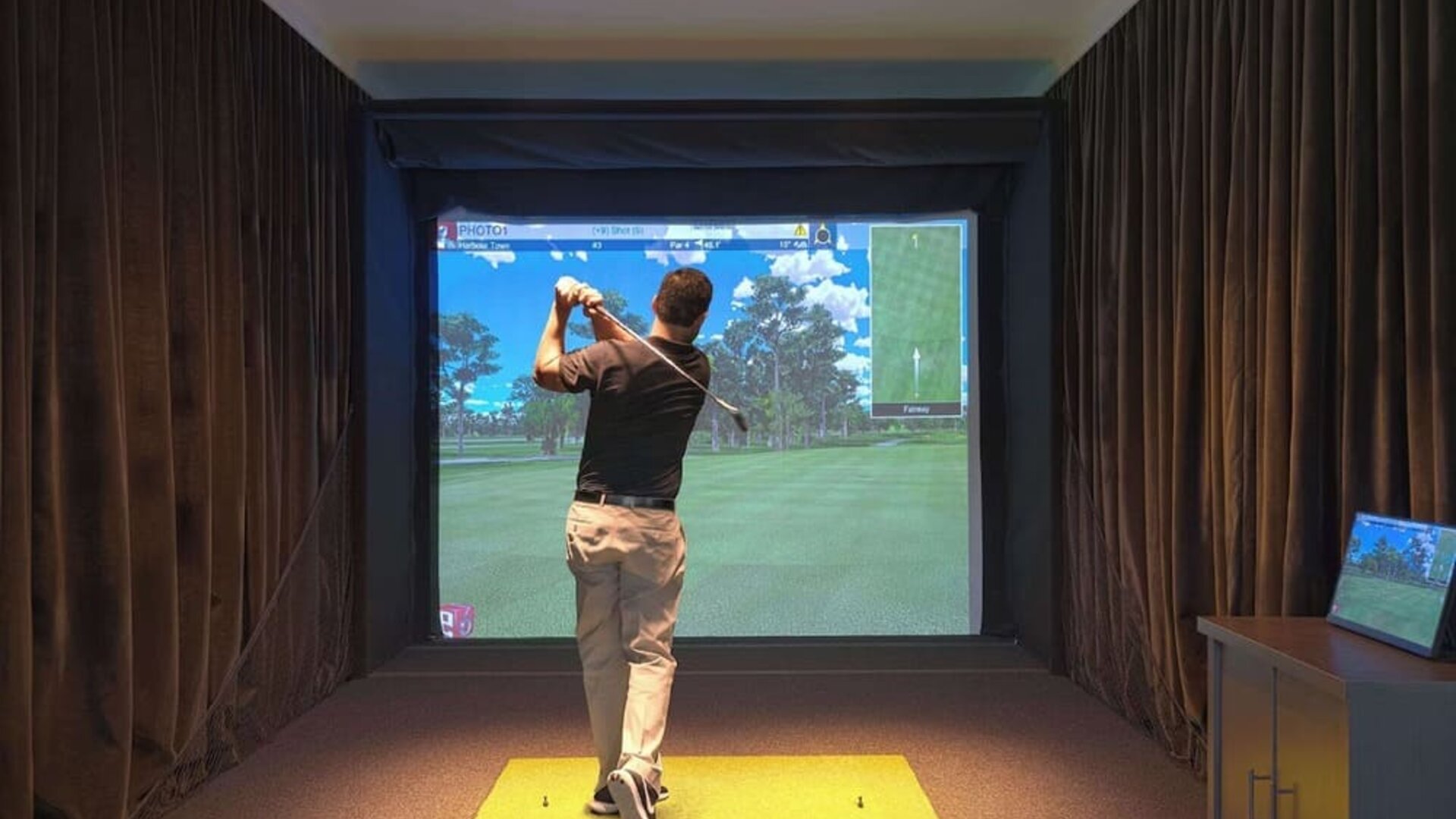 Golf simulators available at Embassy Suites By Hilton Myrtle Beach Oceanfront Resort.