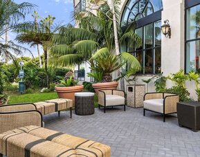 Plenty of seats in the courtyard of Embassy Suites By Hilton Los Angeles International Airport South.