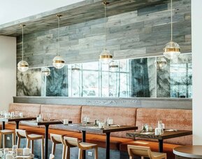Dining area perfect for coworking at Hilton Garden Inn Denver Union Station.