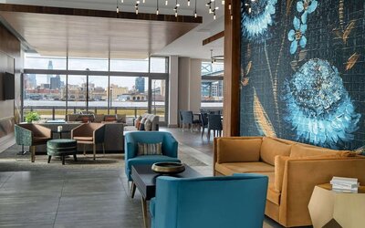 Lobby and coworking lounge at Hilton Garden Inn Camden Waterfront Philadelphia.