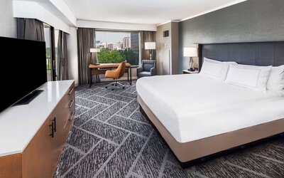 Day use room with work desk and natural light at DoubleTree By Hilton Tulsa - Warren Place.