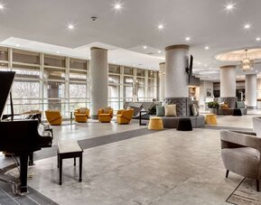 Lobby and coworking lounge at DoubleTree By Hilton Tulsa - Warren Place.