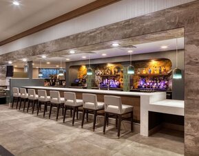 Hotel bar at DoubleTree By Hilton Tulsa - Warren Place.