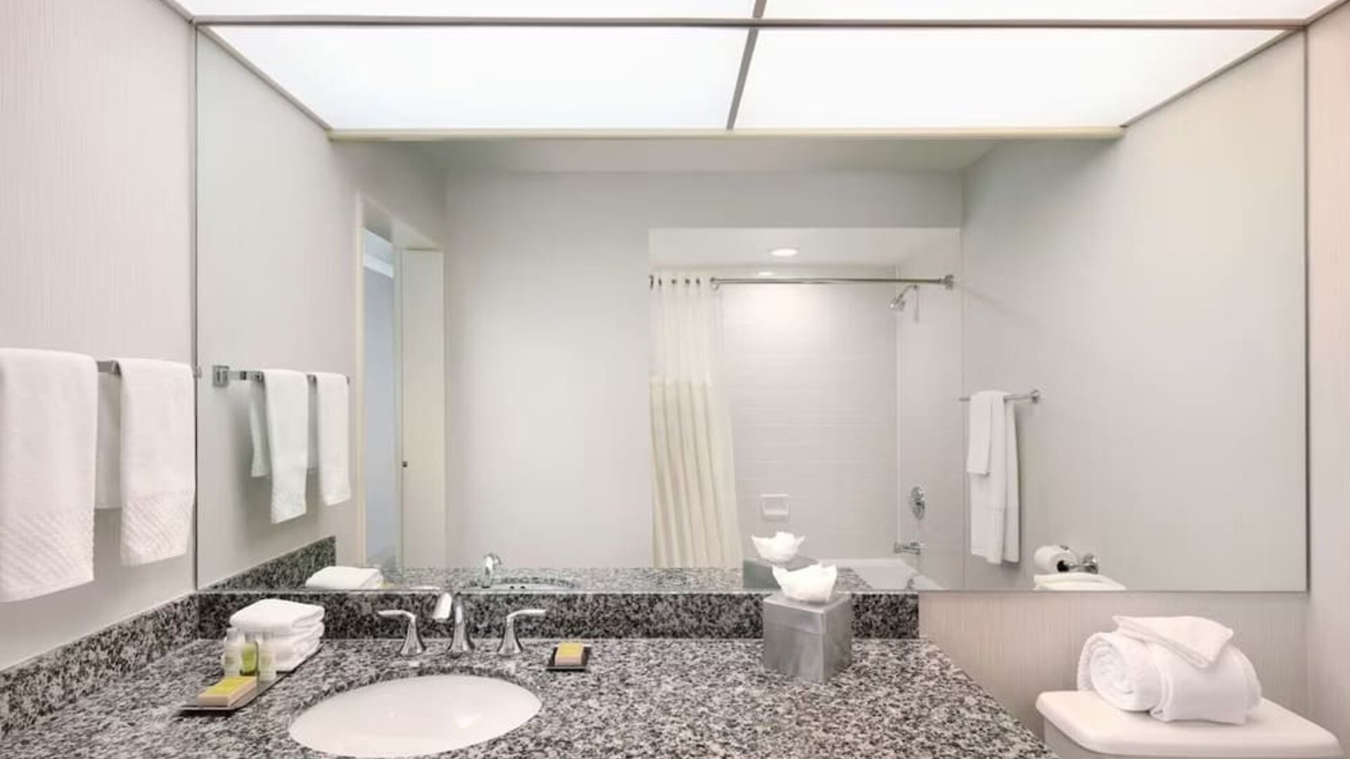 Guest bathroom with shower at DoubleTree By Hilton Sonoma Wine Country.