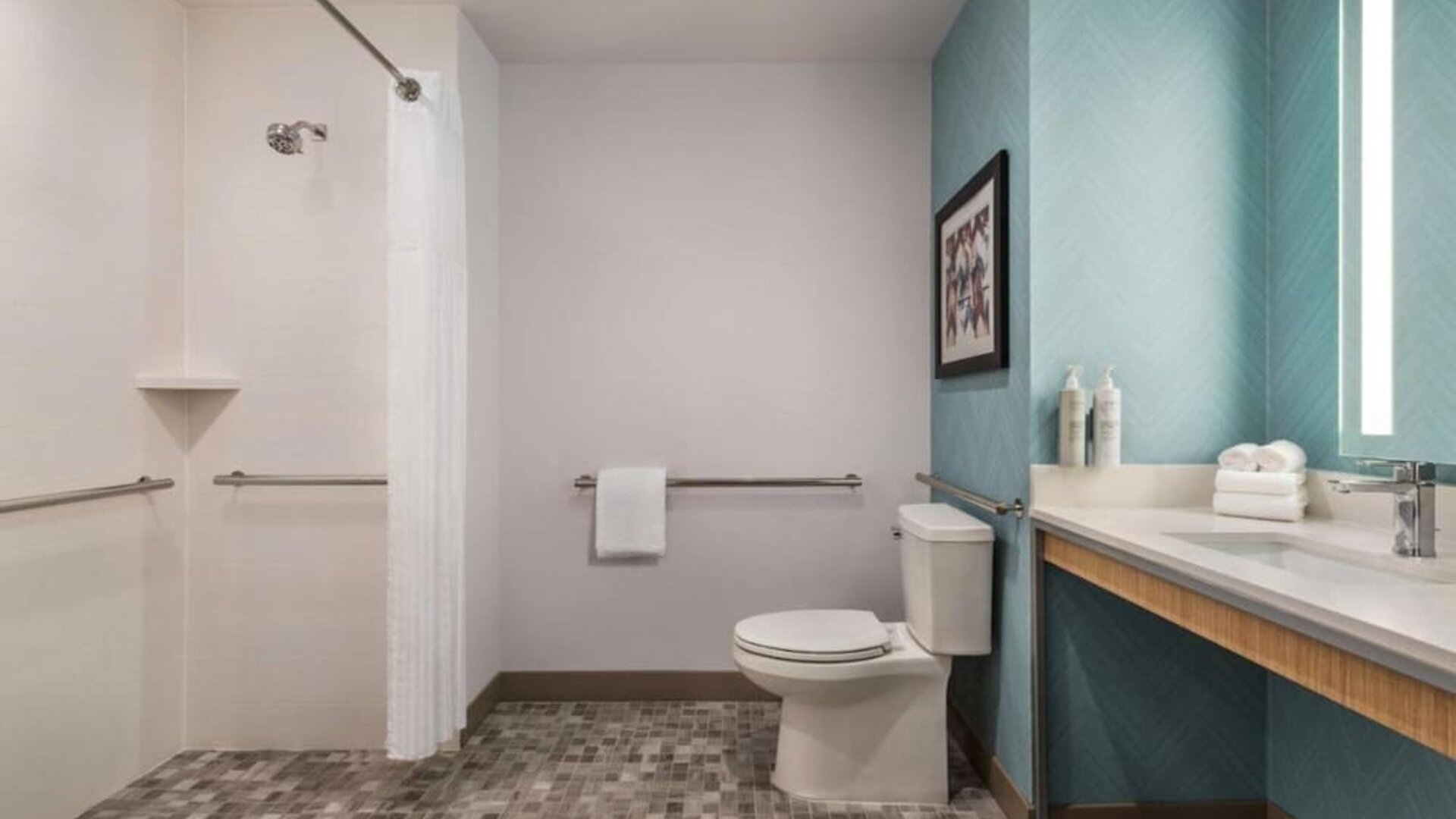 Private guest bathroom with shower at Hilton Garden Inn Nashville West End Avenue.