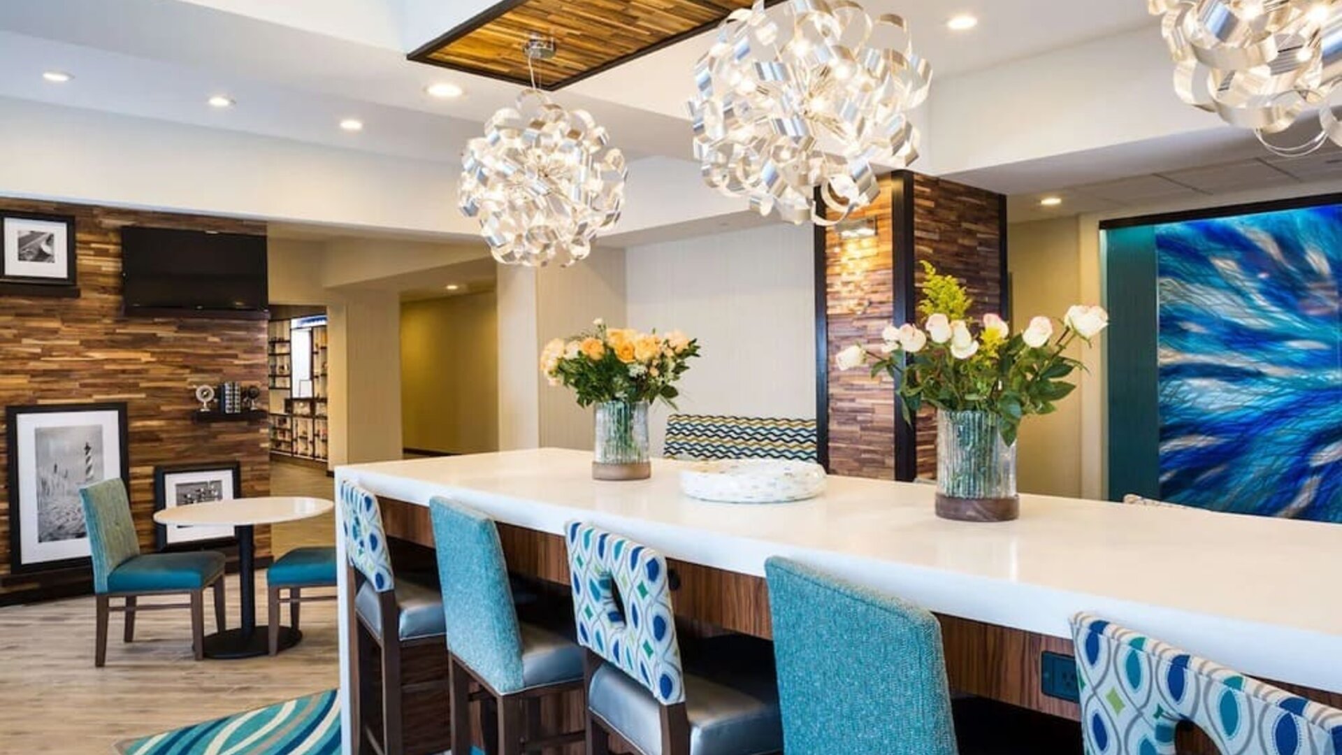 Lobby and coworking lounge at Hampton Inn Atlantic City Absecon, NJ.