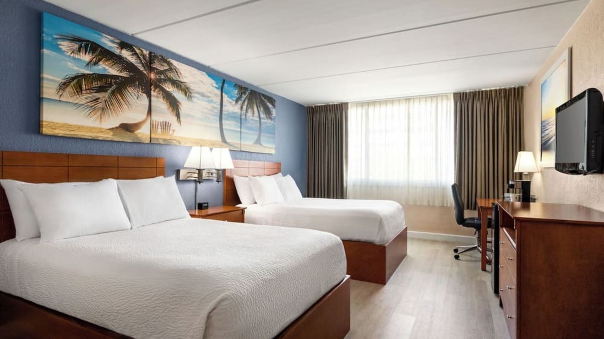 Day use twin room with work desk at EnVision Hotel Miami International Airport.