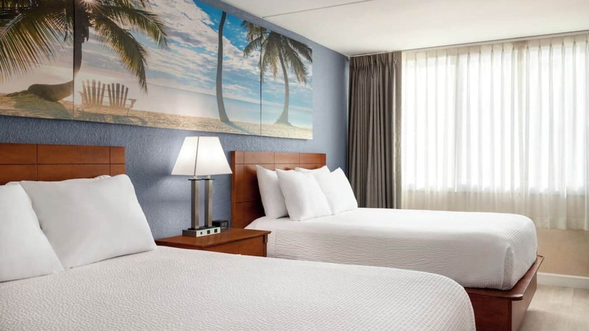Bright and spacious day use twin room at EnVision Hotel Miami International Airport.