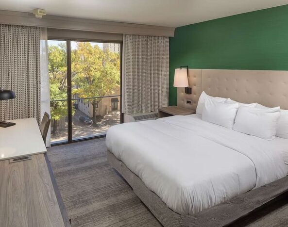 Day use room with work desk and natural light at Hilton Birmingham At UAB.