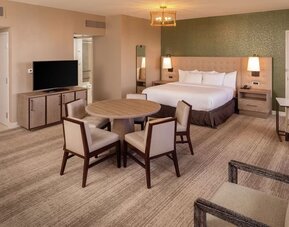 King suite with dining table at Hilton Birmingham At UAB.