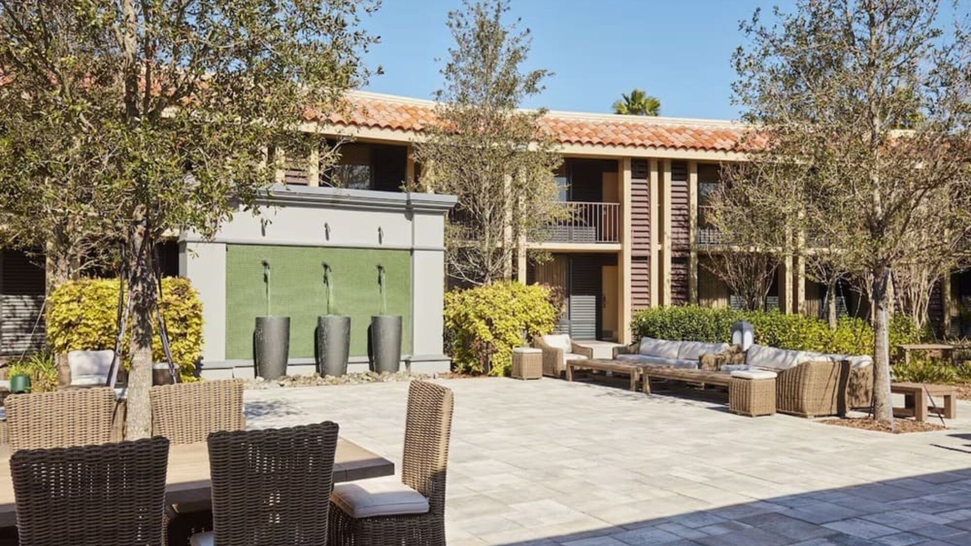 Garden with outdoor furniture at DoubleTree By Hilton Orlando At SeaWorld.