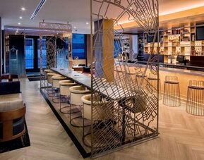 Hotel bar with lounge area at Hilton Brooklyn New York.