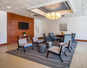 Lobby lounge at EnVision Hotel And Conference Center Mansfield Foxboro.