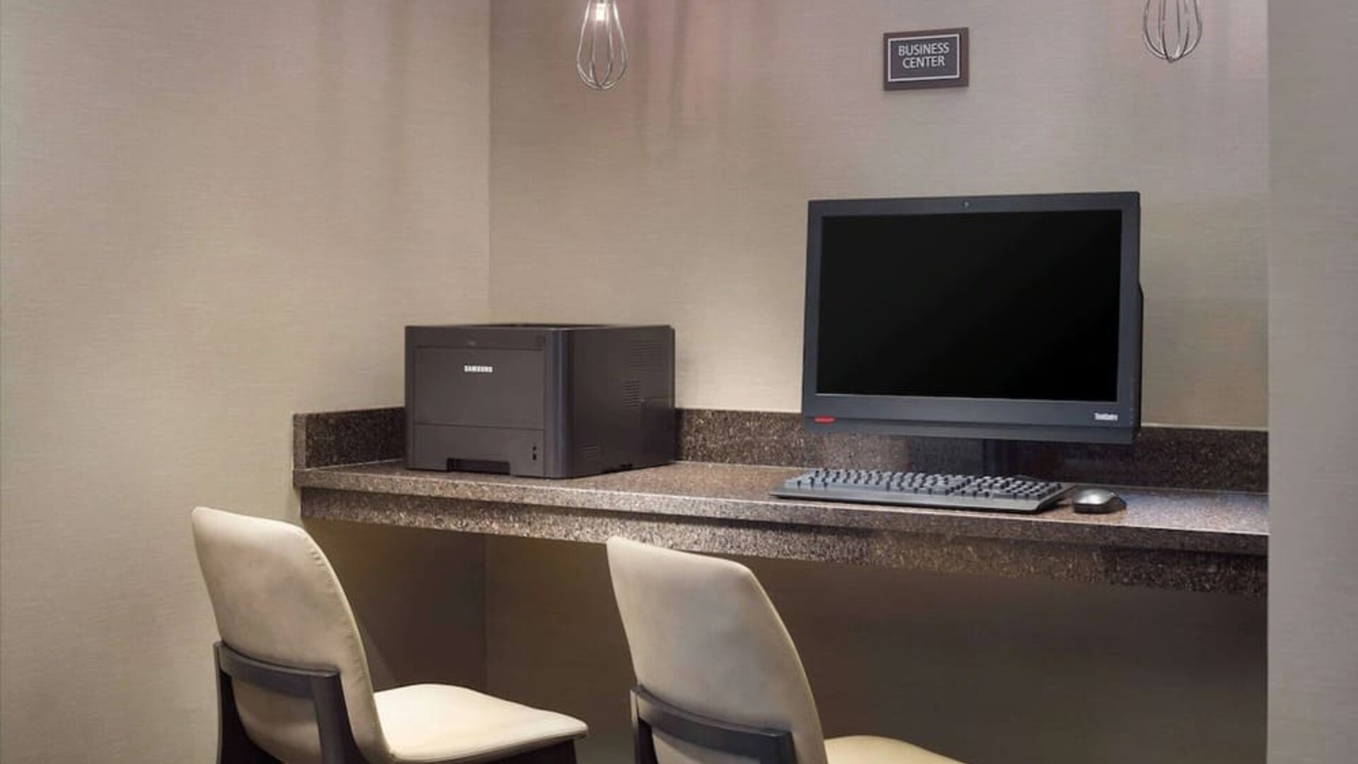 Business center with computer and printer at Sonesta ES Suites Raleigh Cary 