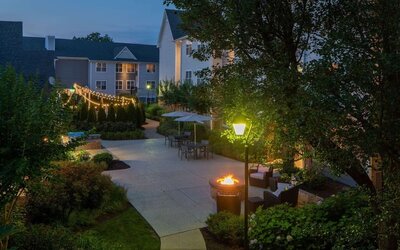 Hotel terrace with lounge seating at Sonesta ES Suites Fairfax Fair Lakes.