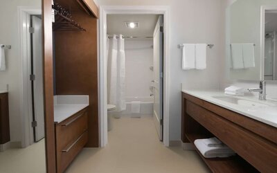 Private guest bathroom with shower at Sonesta ES Suites Fort Worth Fossil Creek.