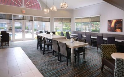 Dining area perfect for coworking at Sonesta ES Suites Dallas Medical Market Center.