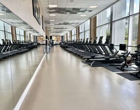Fully equipped fitness center at Hilton Orlando.
