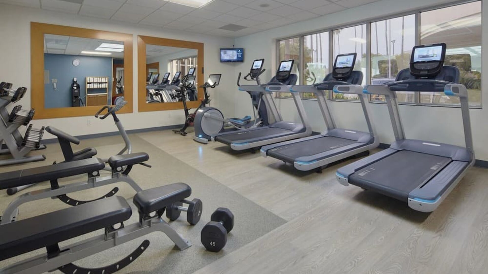 Fitness center at Embassy Suites By Hilton San Diego-La Jolla.